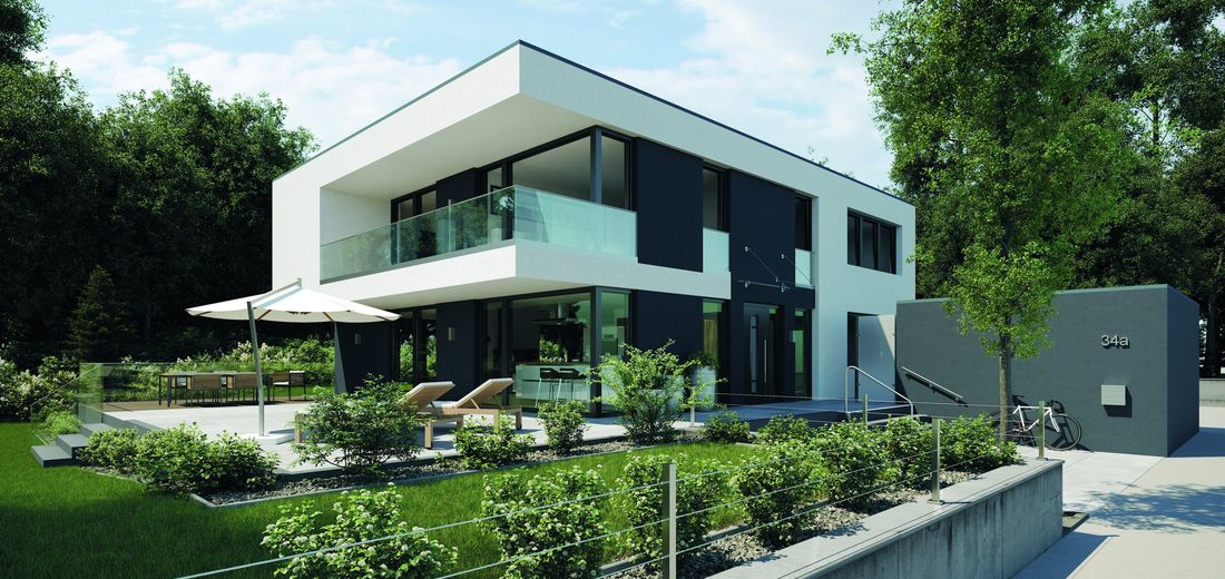 Edelstahl-Geländer mit Glasfüllung an einer modernen Fassade